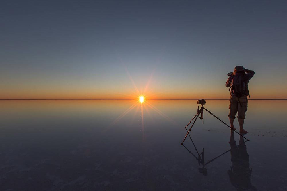 Brad Baker photographer taking photos on Lake Eyre Australia
